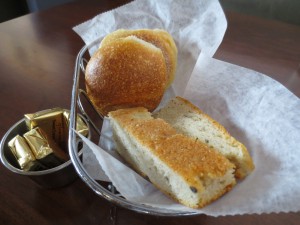 a bread basket with butter