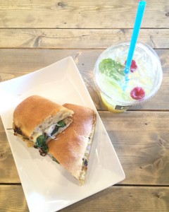 a panini and a drink with mint