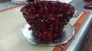 a red basket made out of sugar