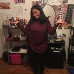 Blog author neffi in burgundy tunic and black pants