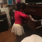 blog author neffi young niece rummaging through clothing drawer