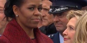 ex first lady michelle obama giving a side stare