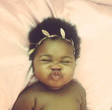 baby blowing kiss