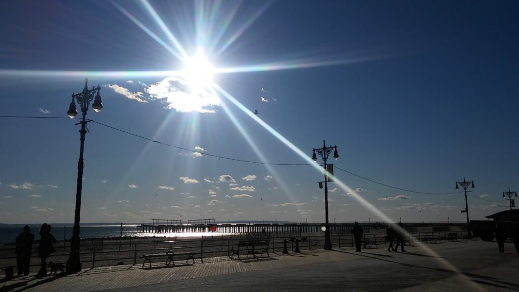 the sun at coney island beach