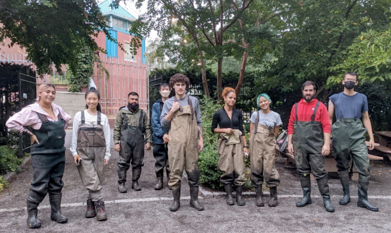 Adult students dressed in waders