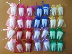 Tooth shaped soap favors in organza bags