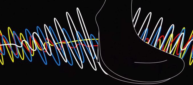 music video still showing a woman's boot stepping through multicolored sound waves